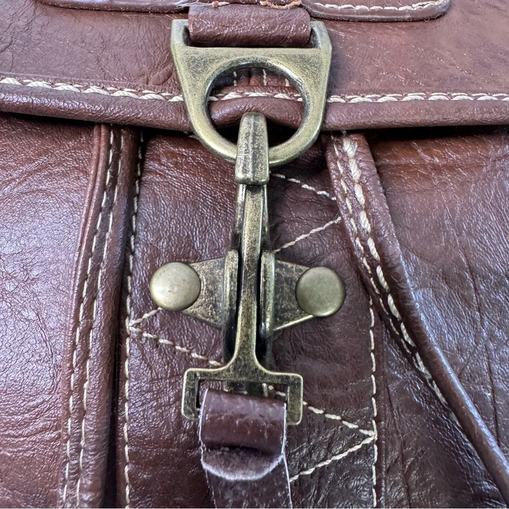 Brown Leather Backpack with Gold Accents